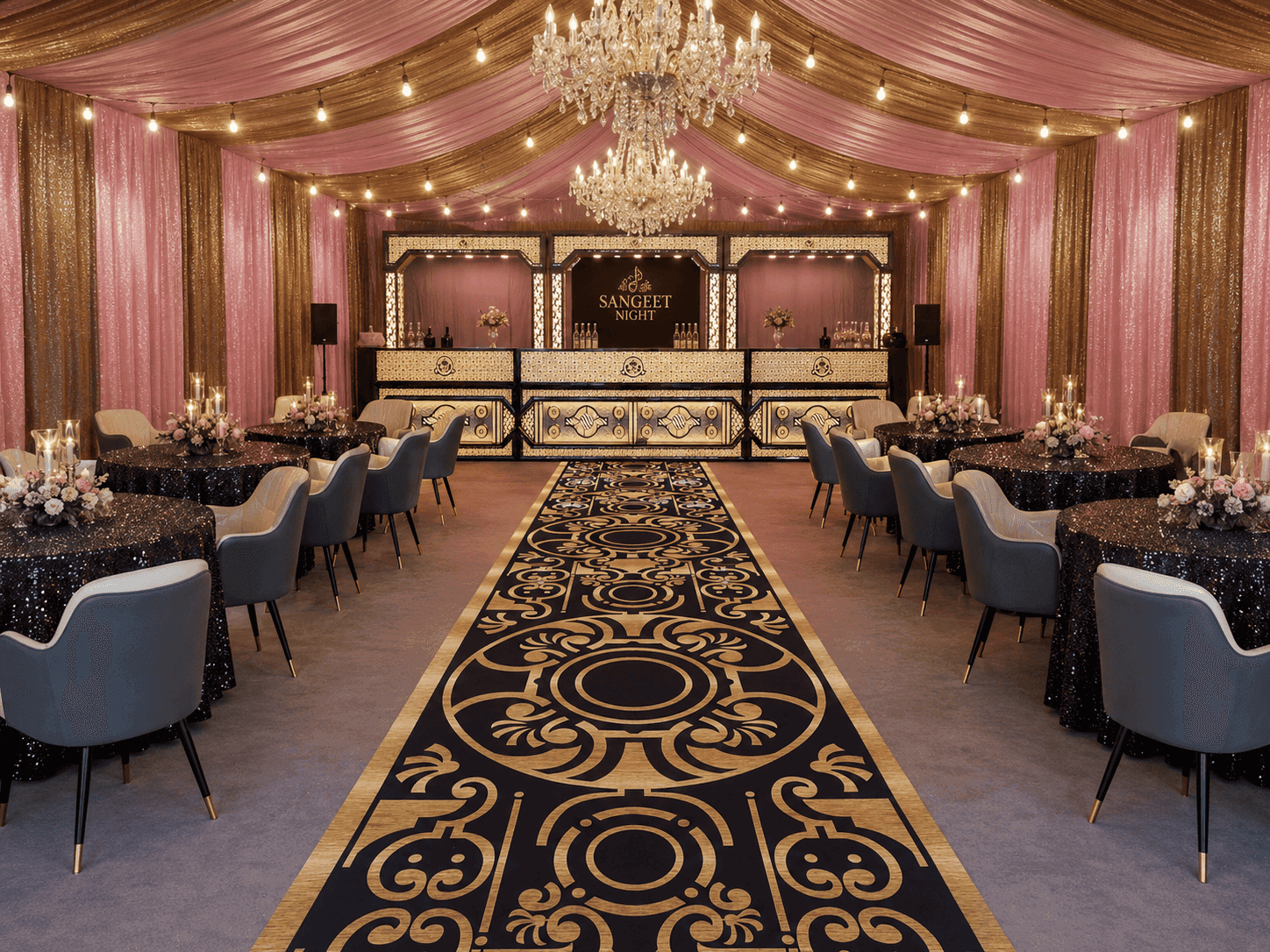 Cocktail and sangeet night lounge with round tables, a patterned carpet and a chandelier-lit bar